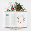 Open Book Mockup With Leaves Psd