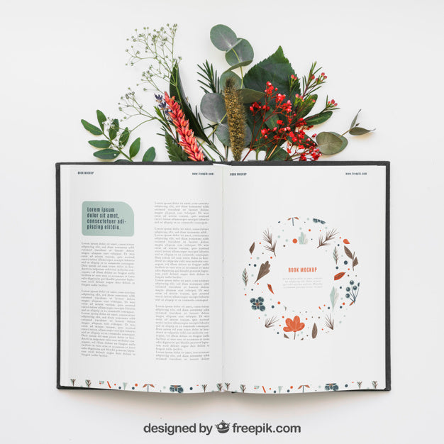 Open Book Mockup With Leaves Psd