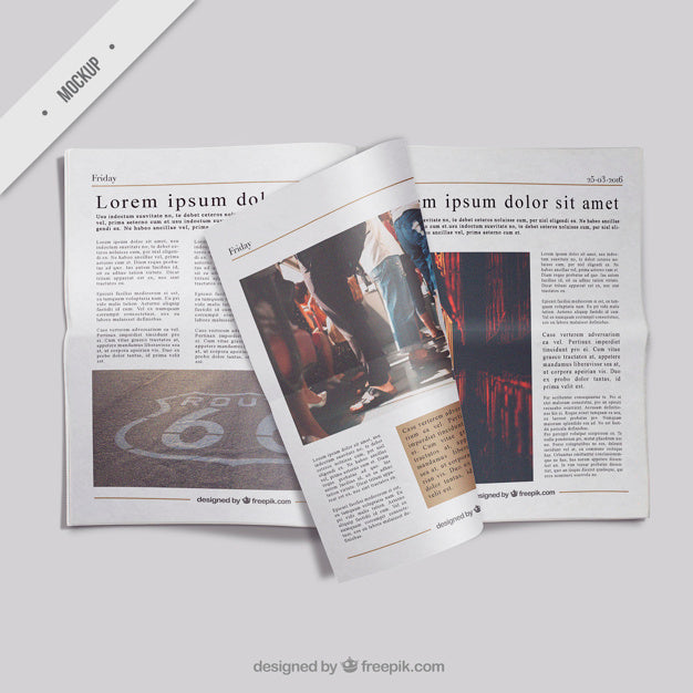 Open Newspaper Mockup With A Folded Page Psd