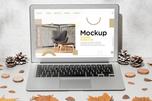 Opened Laptop Mockup On The Table Surrounded By Autumn Leaves Psd