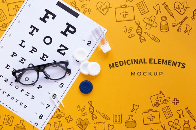 Optics Still Life Arrangement On Yellow Background Psd