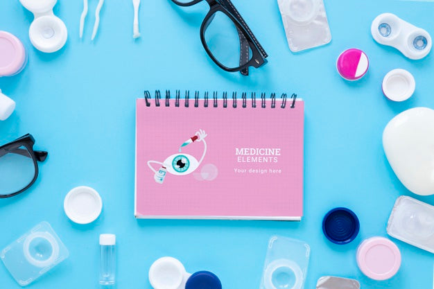 Optics Still Life Arrangement With Notepad Mock-Up Psd