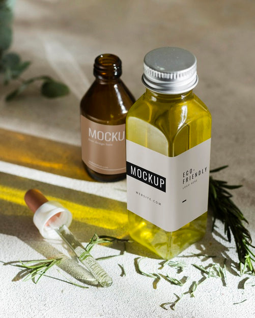 Organic Serum Bottles On Table Psd