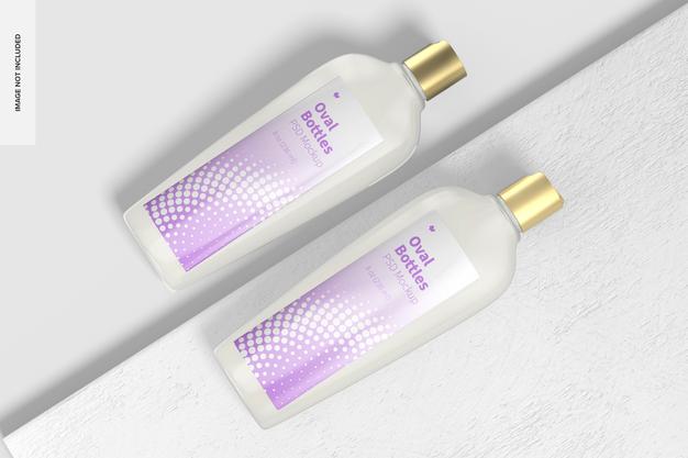 Oval Bottles With Disc Top Cap Mockup, Top View Psd