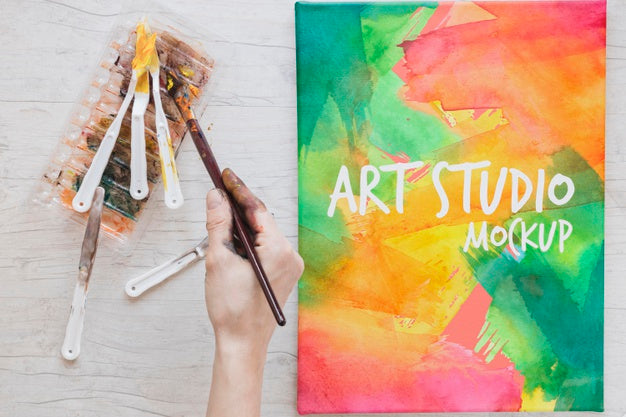 Painting Watercolors And Brushes On Desk Psd