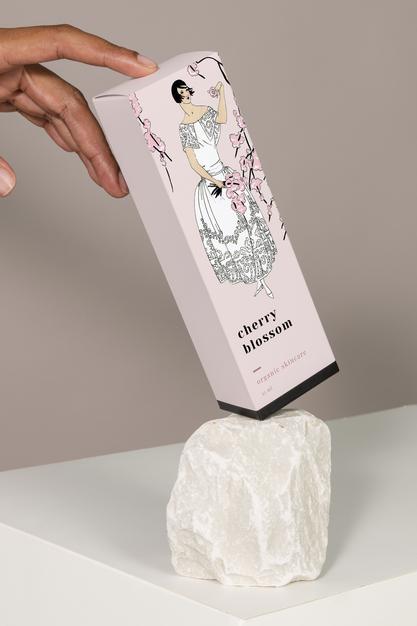 Paper Box Mockup With Woman With Cherry Blossom Psd