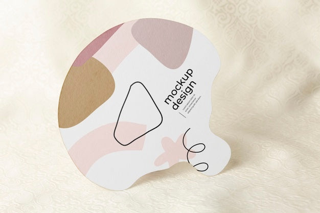 Paper Mock-Up Hand Fan On Textile Psd