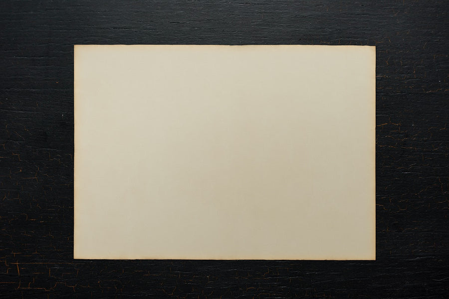 Paper On A Black Wooden Background