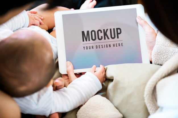 Parents Using Digital Device With Their Baby Psd