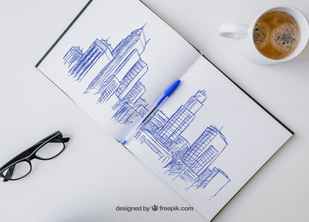 Pen Drawing On The Notebook With Glasses And Coffee Mug Psd