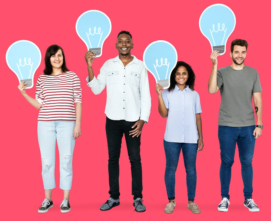 People Carrying Light Bulb Icons