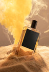 Perfume Bottle In Sand Psd