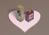 Perfume Box And Bottle On Heart Shape Psd