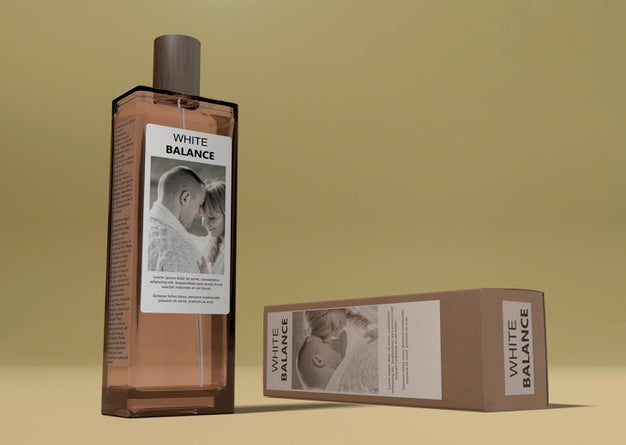 Perfume Box Beside Bottle On Table Psd