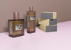 Perfume Boxes Stacked Beside Perfume Bottles Psd