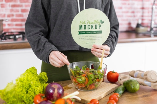 Person At Home With Bowl Of Salad Psd