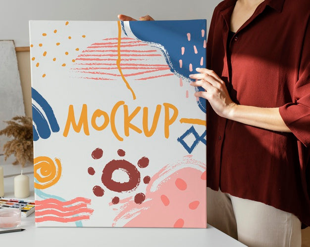 Person Holding A Canvas Mock-Up Psd