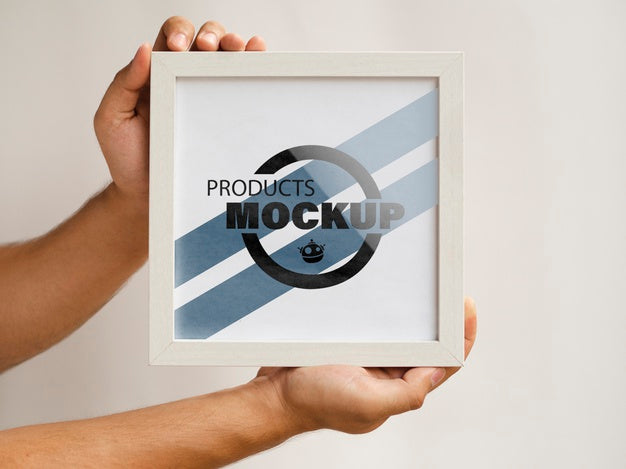 Person Holding A Frame Mock-Up Psd