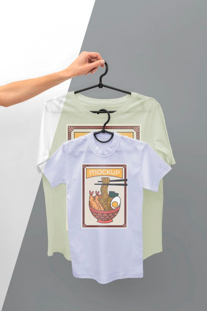 Person Holding A Japanese T-Shirt Mock-Up Psd