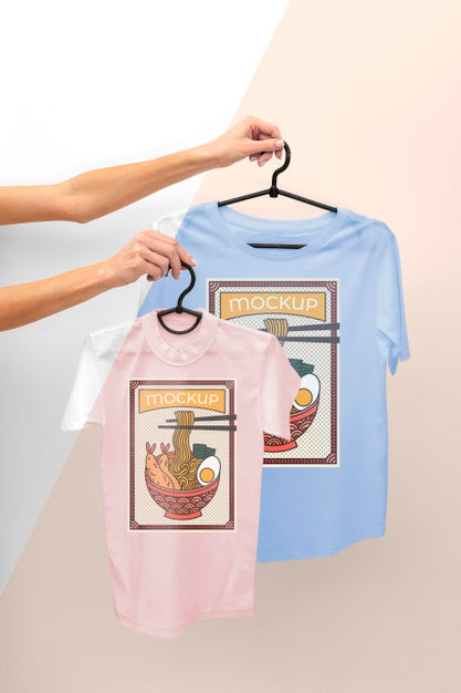 Person Holding A Japanese T-Shirt Mock-Up Psd