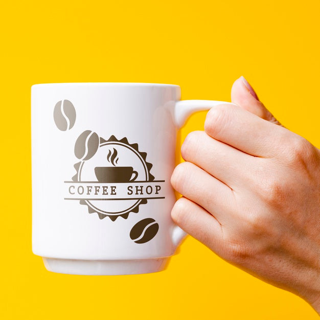 Person Holding Mug Mock-Up Psd