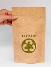 Person Holding Paper Bag Mock-Up Psd