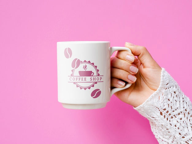 Person Holding White Mug Mock-Up On Pink Background Psd