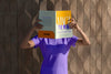 Person Reading Color Pop Magazine With Cover Mockup Psd