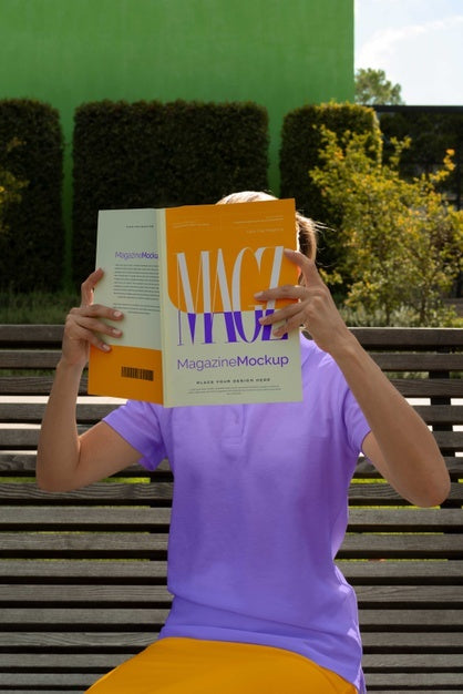 Person Reading Color Pop Magazine With Cover Mockup Psd
