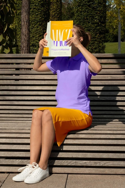 Person Reading Color Pop Magazine With Cover Mockup Psd