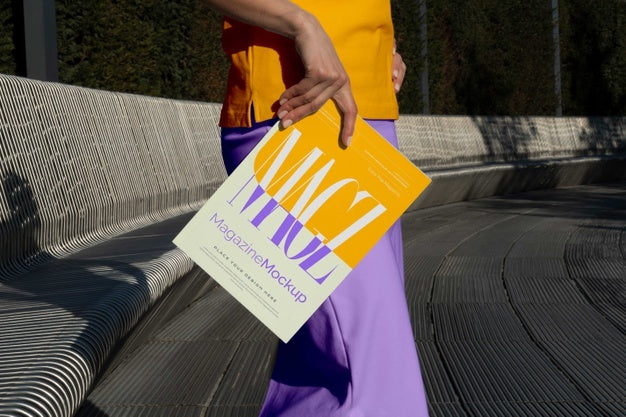 Person Reading Color Pop Magazine With Cover Mockup Psd