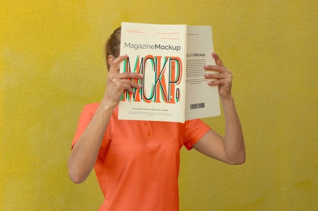 Person Reading Color Pop Magazine With Cover Mockup Psd