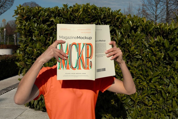 Person Reading Color Pop Magazine With Cover Mockup Psd