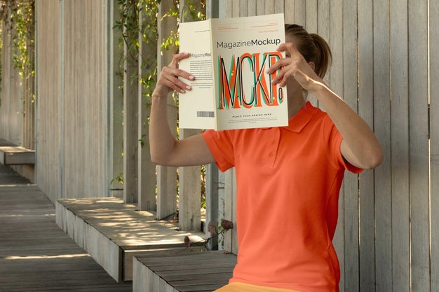 Person Reading Color Pop Magazine With Cover Mockup Psd