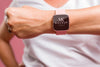 Person Wearing A Mock-Up Smartwatch Psd