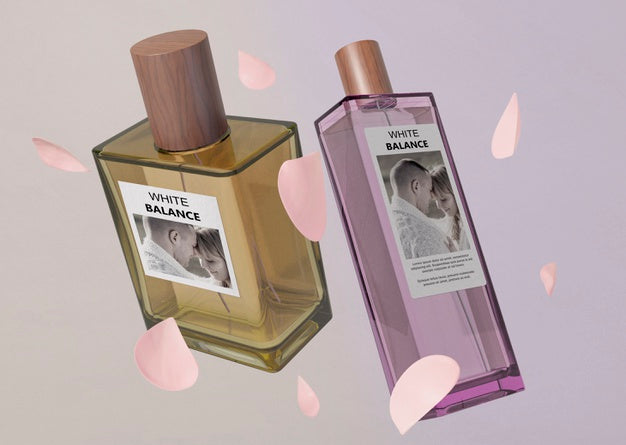 Petals And Perfume Bottles On Table Psd