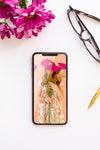 Phone Mock-Up Near Flowers And Glasses Psd