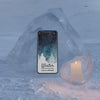Phone On Ice Block Light By Candle Psd