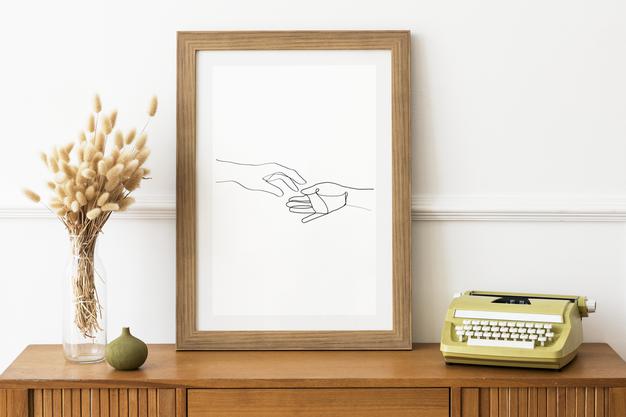 Picture Frame Mockup On A Wooden Sideboard Table By A Typewriter Psd