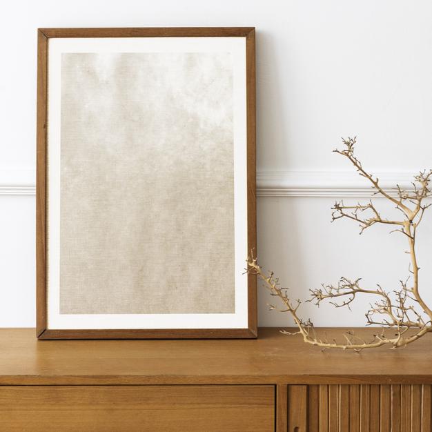 Picture Frame Mockup On A Wooden Sideboard Table Psd
