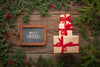 Pile Of Gifts And Christmas Pine Leaves Psd