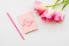 Pink Flowers Concept With Notebook Psd