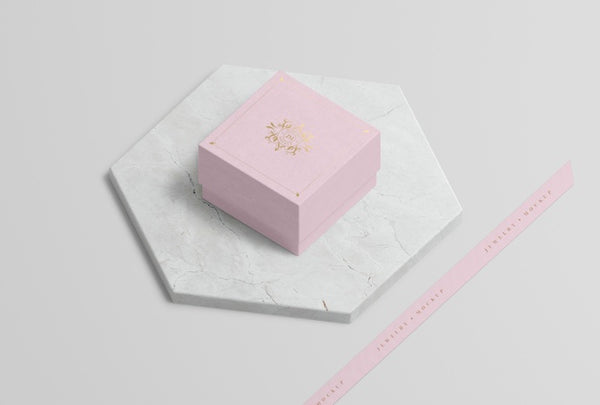 Pink Jewelry Box On Marble With Golden Symbol Psd - Mockup Hunt