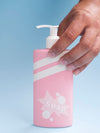 Pink Liquid Soap Bottle On Blue Background Psd