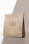 Plastic Bag With Coffee Mock Up On Table Psd