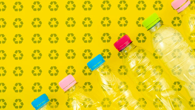 Plastic Bottles On Background Mock-Up Psd