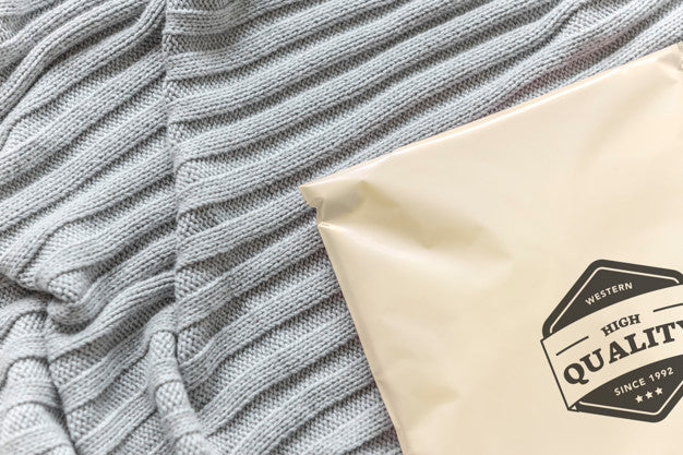 Plastic Package Mockup On A Bed Psd