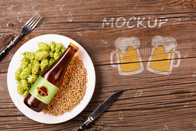 Plate With Beer Ingredients And Bottle Of Beer Psd