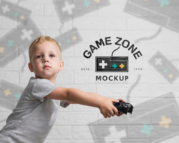Portrait Of Cute Boy Playing On Console Psd