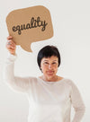 Portrait Of Mature Woman Holding Equality Sign Psd